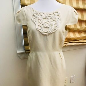 White dress with m top beading